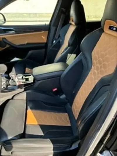 BMW X4 2023 — SUV coupé haute performance 510 ch, traction intégrale — Heckansicht