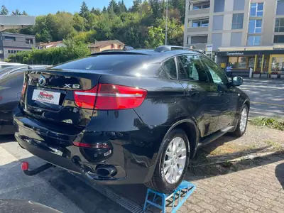 BMW X6 2009 — SUV coupé premium, moteur diesel récent, AWD — interior