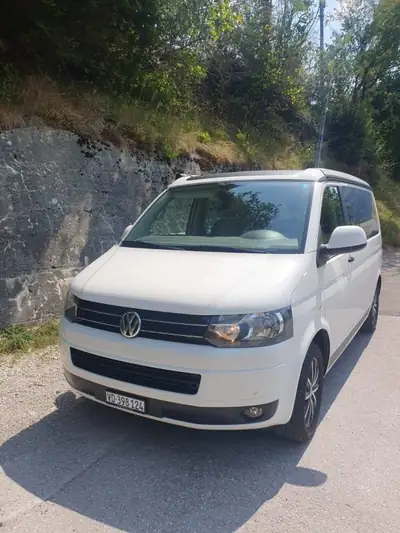 VW T5 California — Aménagé camping-car, diesel robuste, 101'000 km — side view
