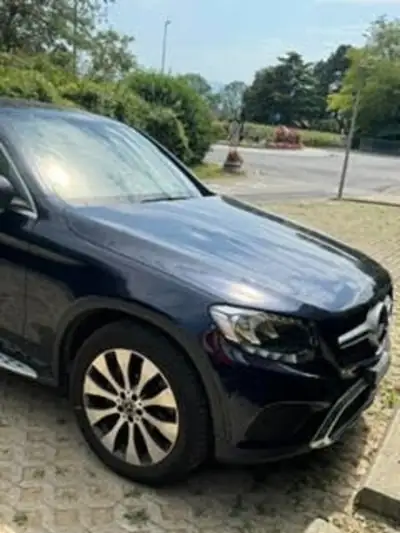 Mercedes-Benz GLC 250 Coupé AMG Line — SUV sportif 211 ch, AWD, pneus hiver inclus — Seitenansicht