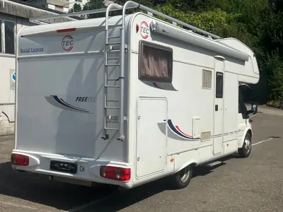 Ford Transit 2006 — Camping-car aménagé 5 places, moteur indestructible 2.4L Turbo — rear view