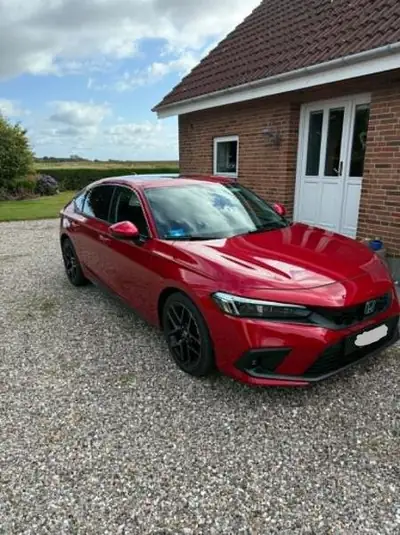 Honda Civic 2.0 i-MMD e:HEV Advance — Hybride intégral, consommation ultra-économique — fianco