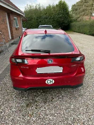 Honda Civic 2.0 i-MMD e:HEV Advance — Hybride intégral, consommation ultra-économique — vista posteriore