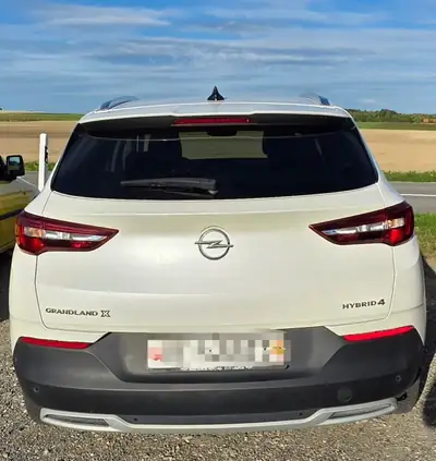 Opel Grandland X Hybrid4 — SUV plug-in 300 ch, batterie neuve, 4x4 intelligent — côté