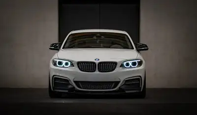BMW M240i Coupé 2016 — 340 ch, pack M-Performance complet et suspensions abaissées — côté