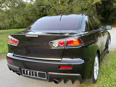 Mitsubishi Lancer Evolution X — Berline sportive turbo 295 ch, transmission intégrale — Miniature 8