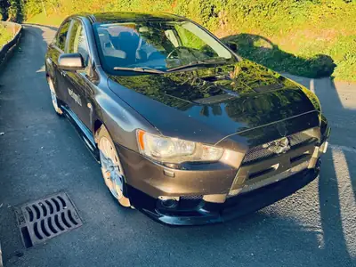 Mitsubishi Lancer Evolution X — Berline sportive turbo 295 ch, transmission intégrale — Miniature 11
