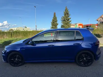 VW Golf 2016 — Berline polyvalente 300 ch, transmission automatique — fianco