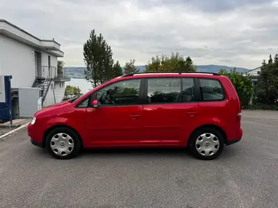 VW Touran 2004 — Monospace diesel robuste, 5 places, 4 pneus hiver inclus — côté
