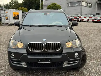 BMW X5 2010 — SUV premium robuste, 272 ch et transmission automatique — vista esterna