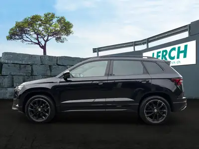 Skoda Karoq 190 ch TSI — SUV polyvalent tout-terrain, technologie premium et faible kilométrage — vista posteriore