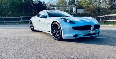 Karma Revero 2018 — Berline hybride rechargeable élégante, 81'000 km — side view